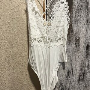 Elegant White Lace Bodysuit